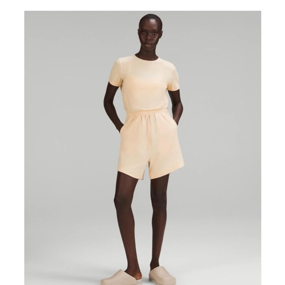 Lululemon Lightweight High-Neck Romper in
Prosecco Sz. 10